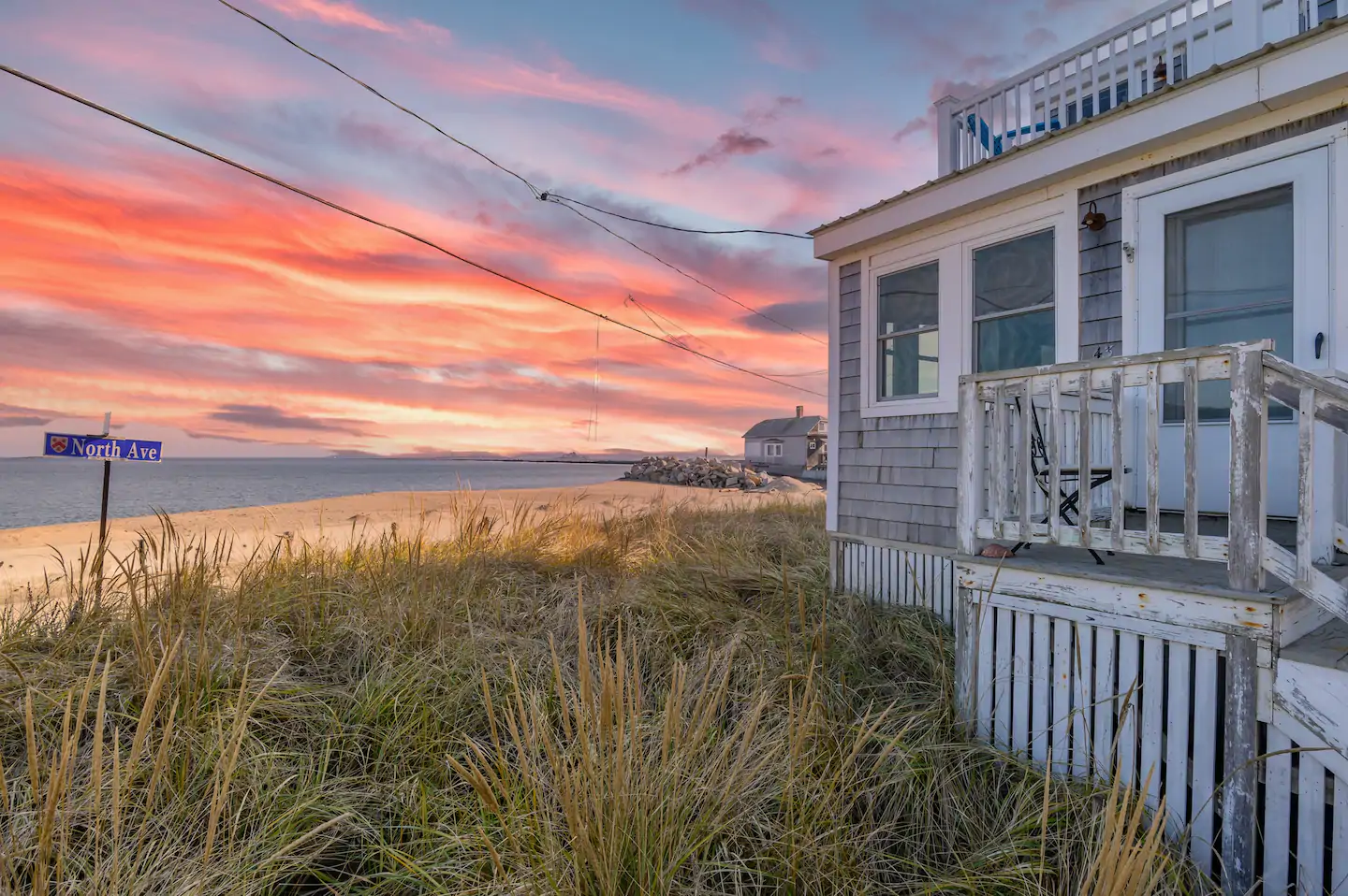 This rustic seaside cottage is situated in a breathtaking setting.