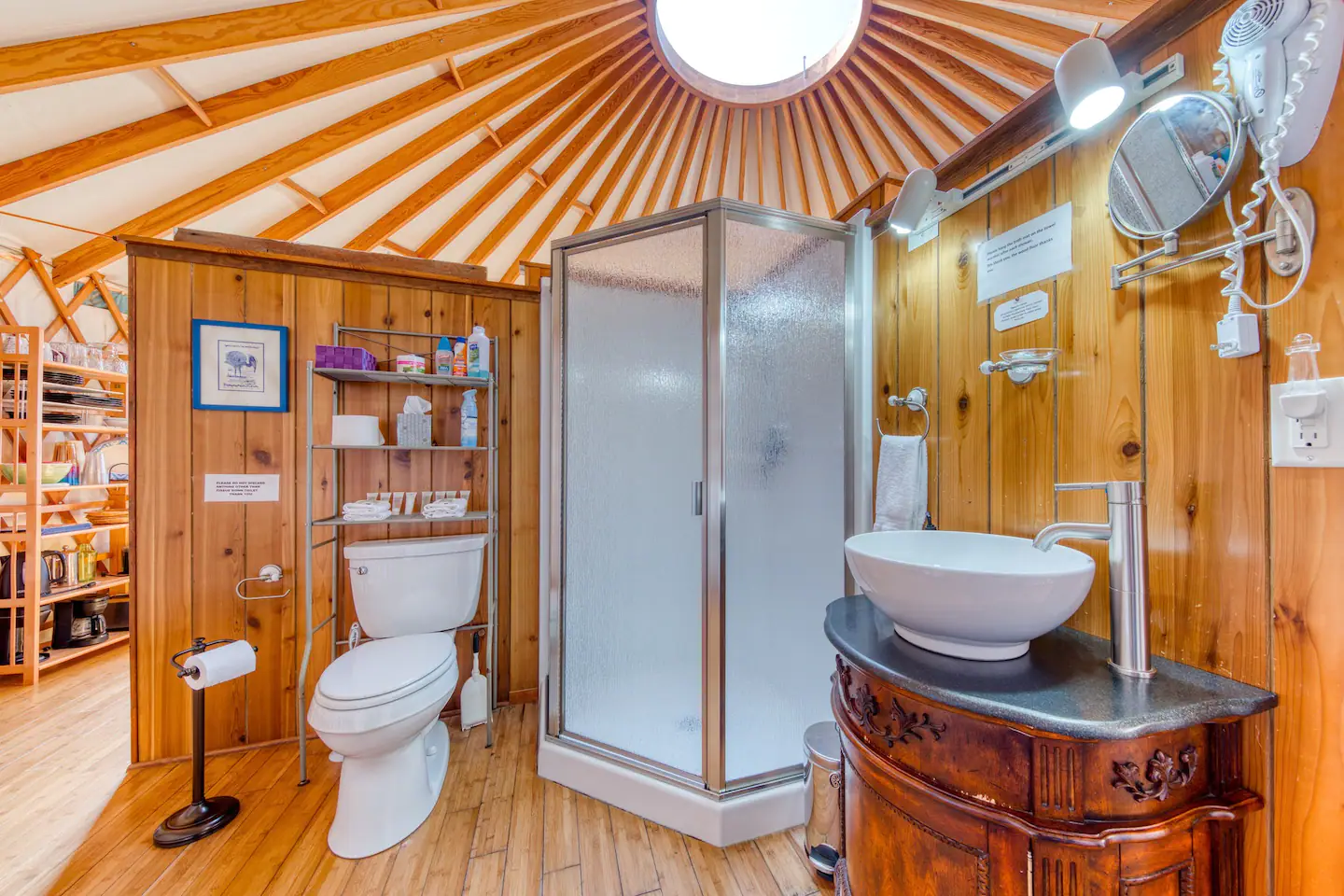 A bathroom with a walk-in shower
