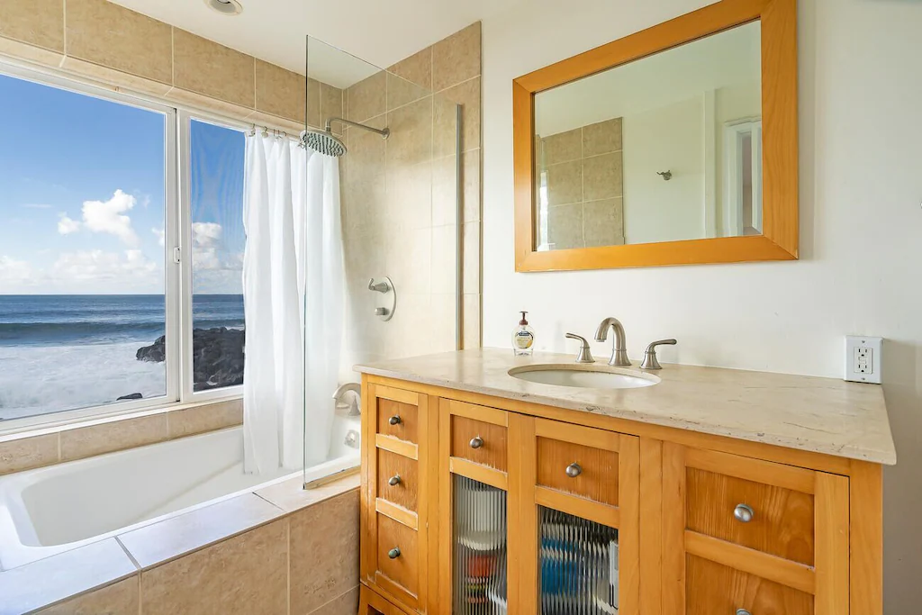 Bathroom with a view of the beach