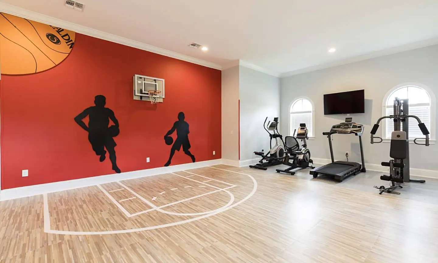 Have fun and exercise in this basketball court and gym.