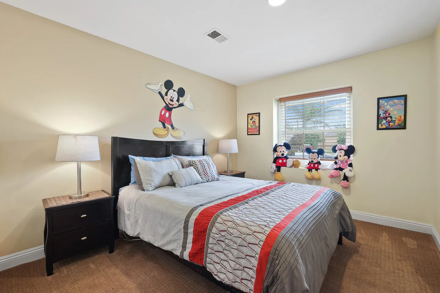 Guest bedroom that is mickey mouse-themed