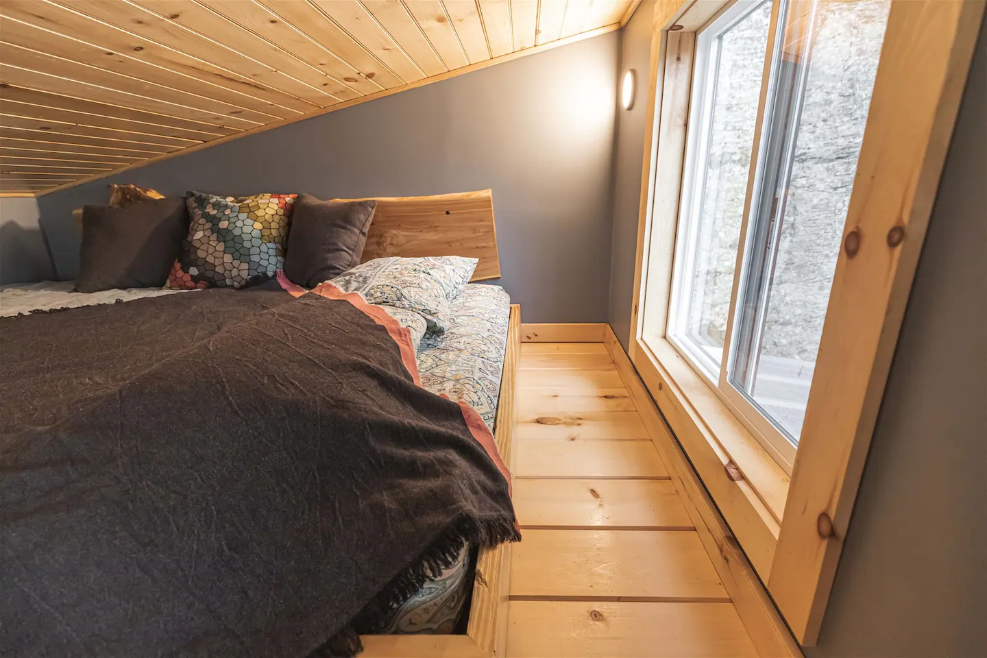The lofted queen bed is quite comfortable.