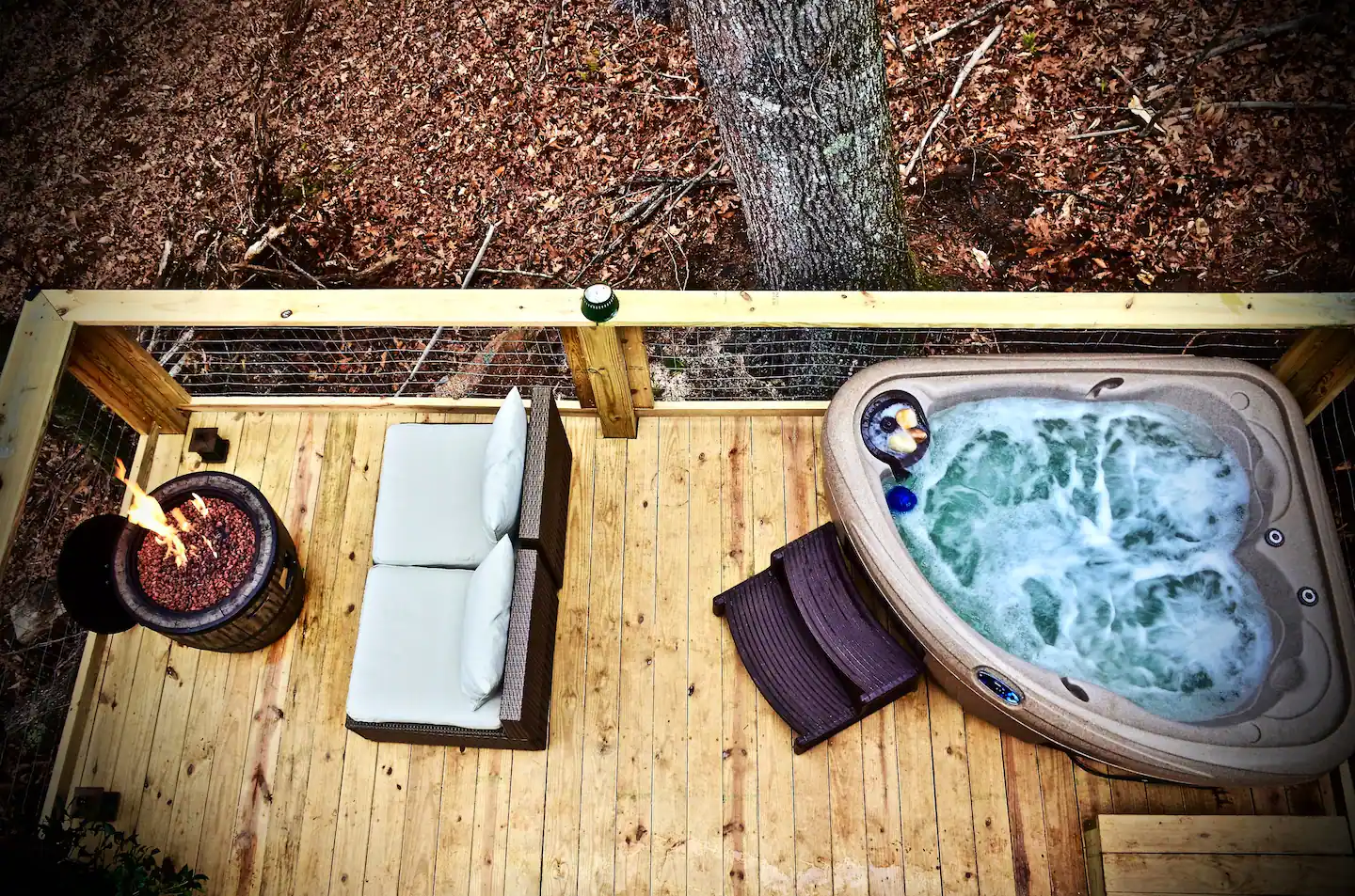 View from above of the hot tub and fire table - ideal for a romantic evening for two.