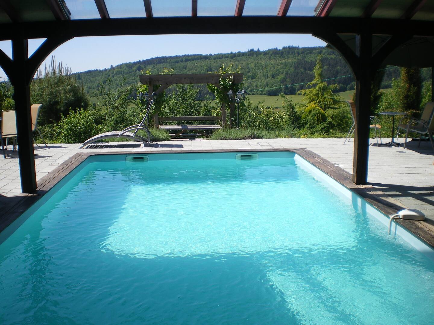 Outdoor semi-covered swimming pool