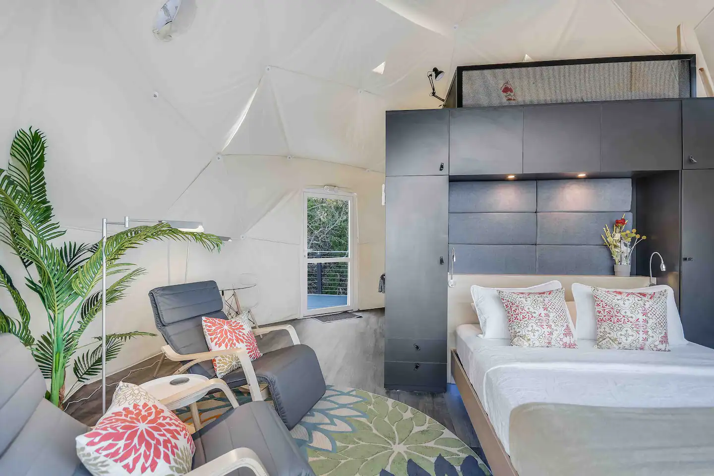 The main floor is unusually outfitted with a "floating" queen-size bed.
