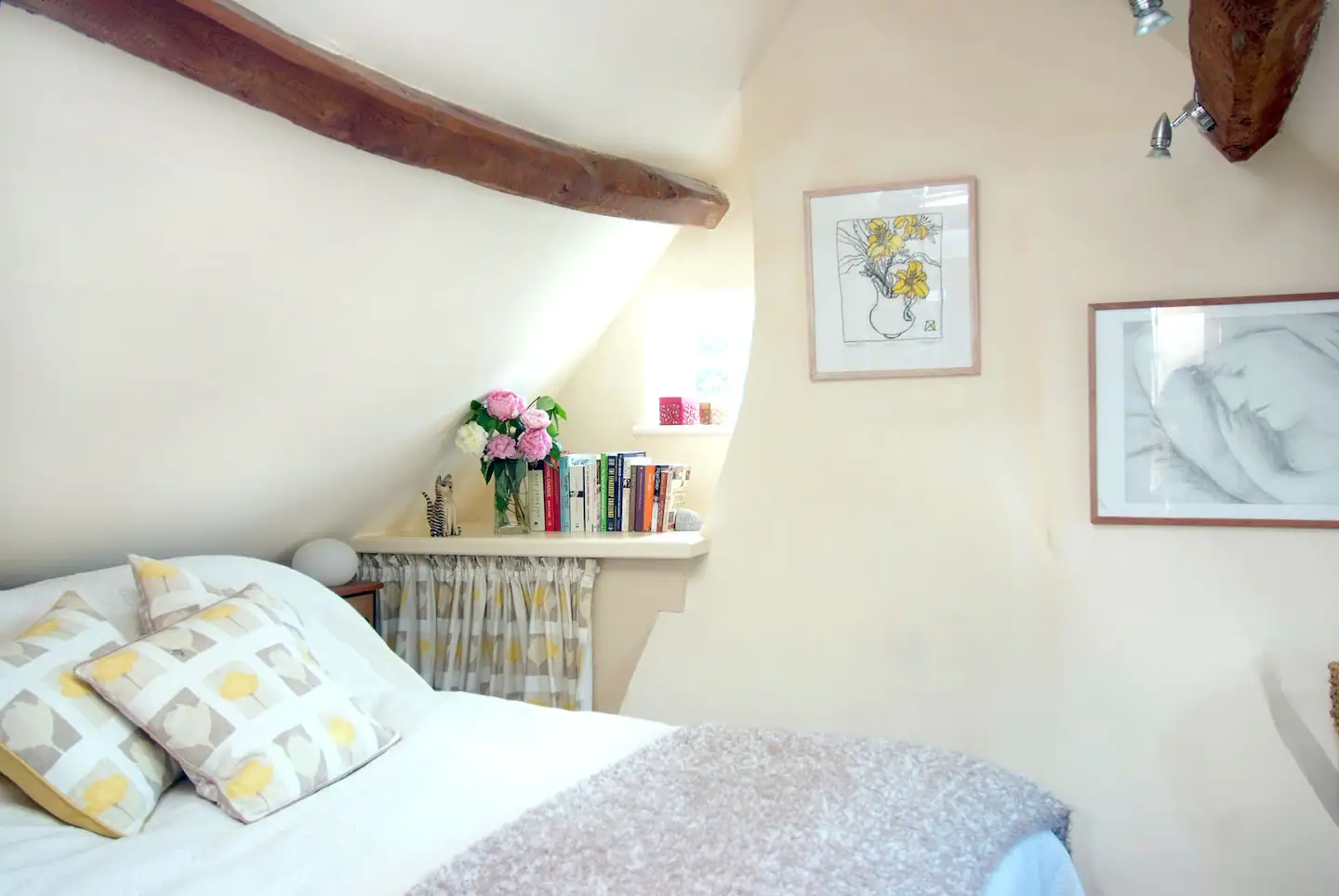 A charming rural bedroom with cotton bedlinen, sprting down, a down and feather blanket, and pillows (there are also synthetic alternatives)