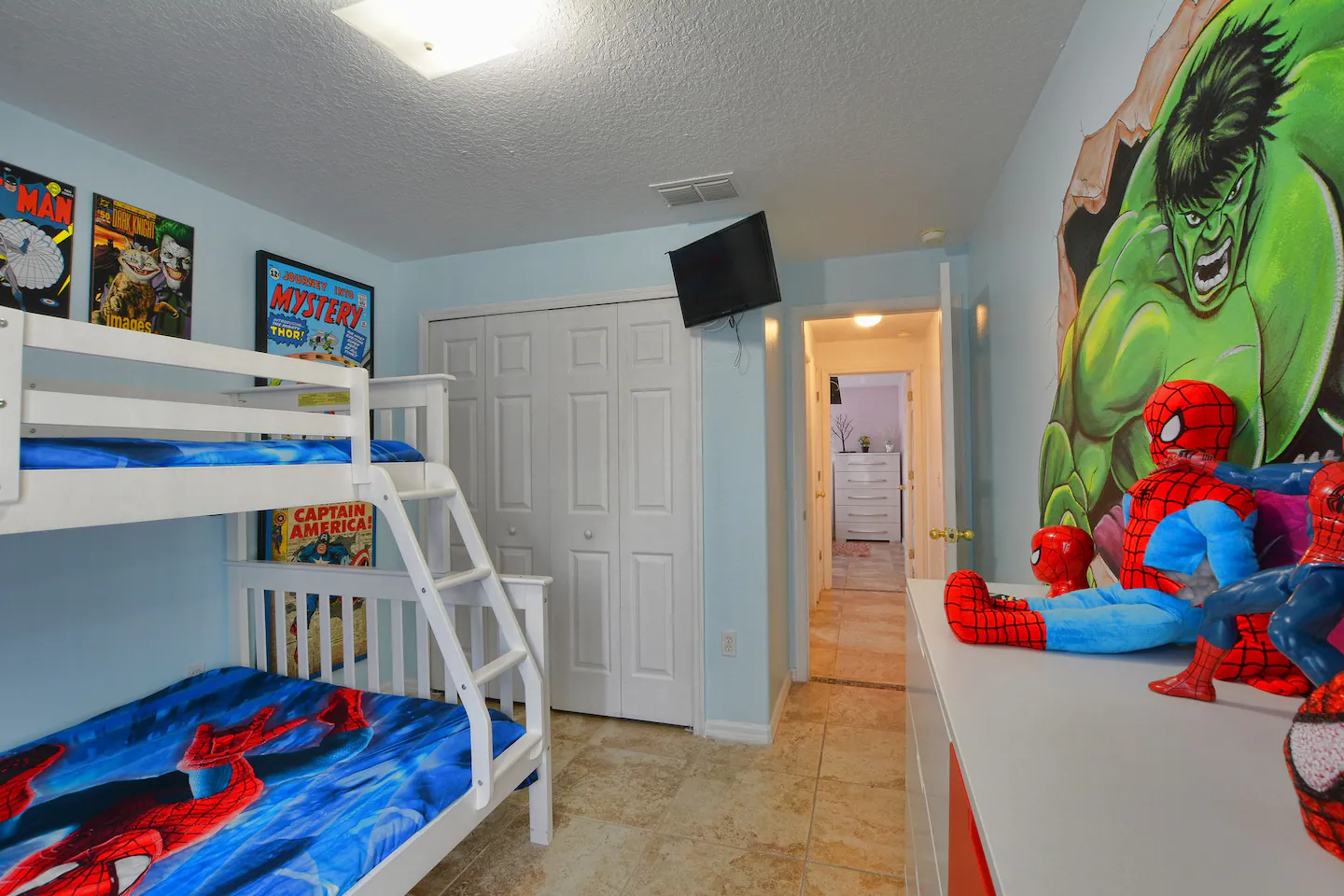Marvel-themed bedroom with bunk beds