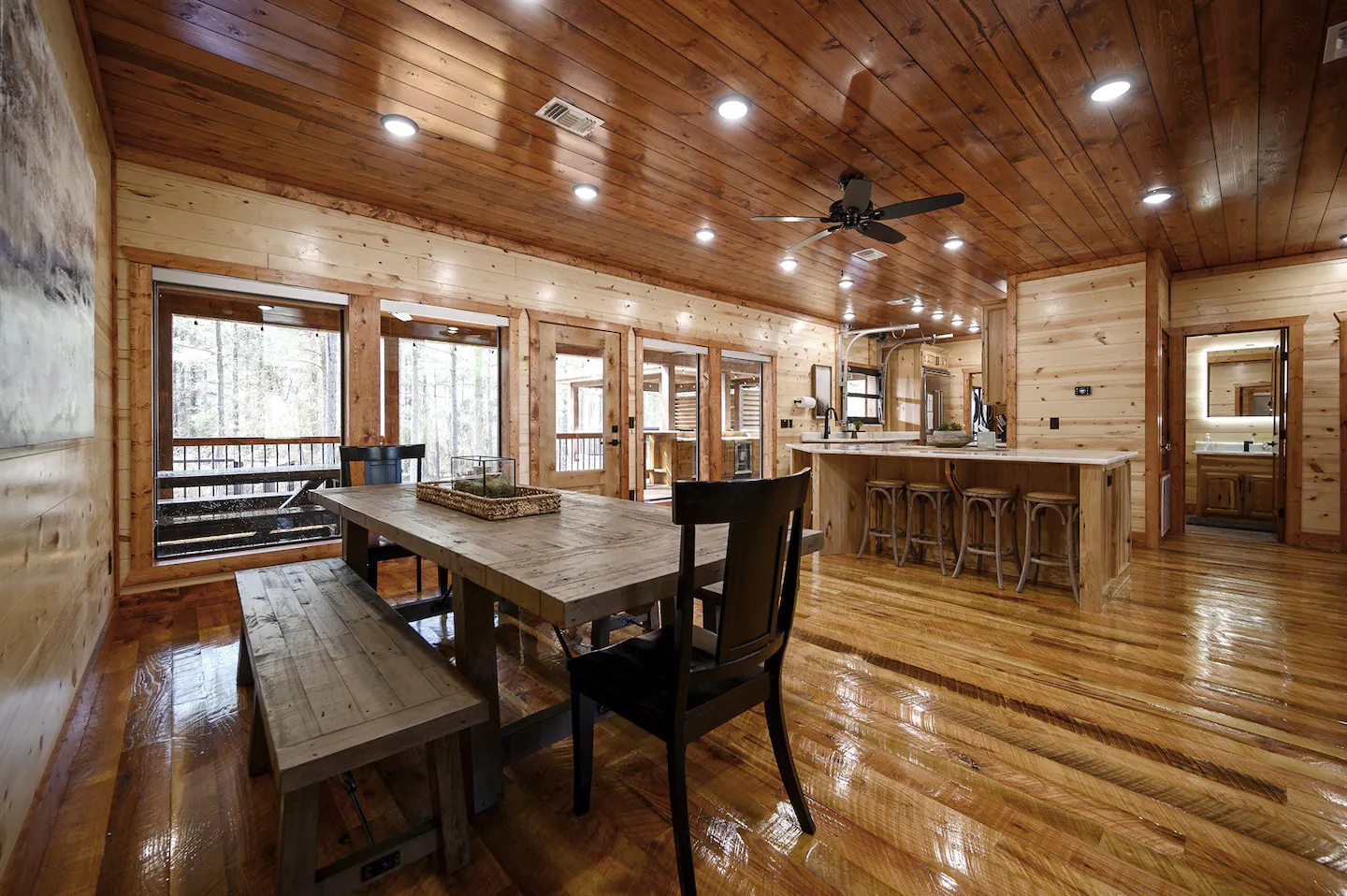 There is a spacious kitchen table that offers plenty of room for meals and gatherings.