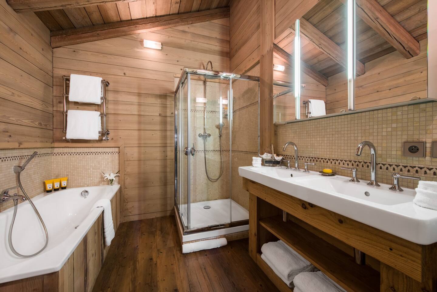 Fully equipped bathroom with a refreshing shower and modern amenities.