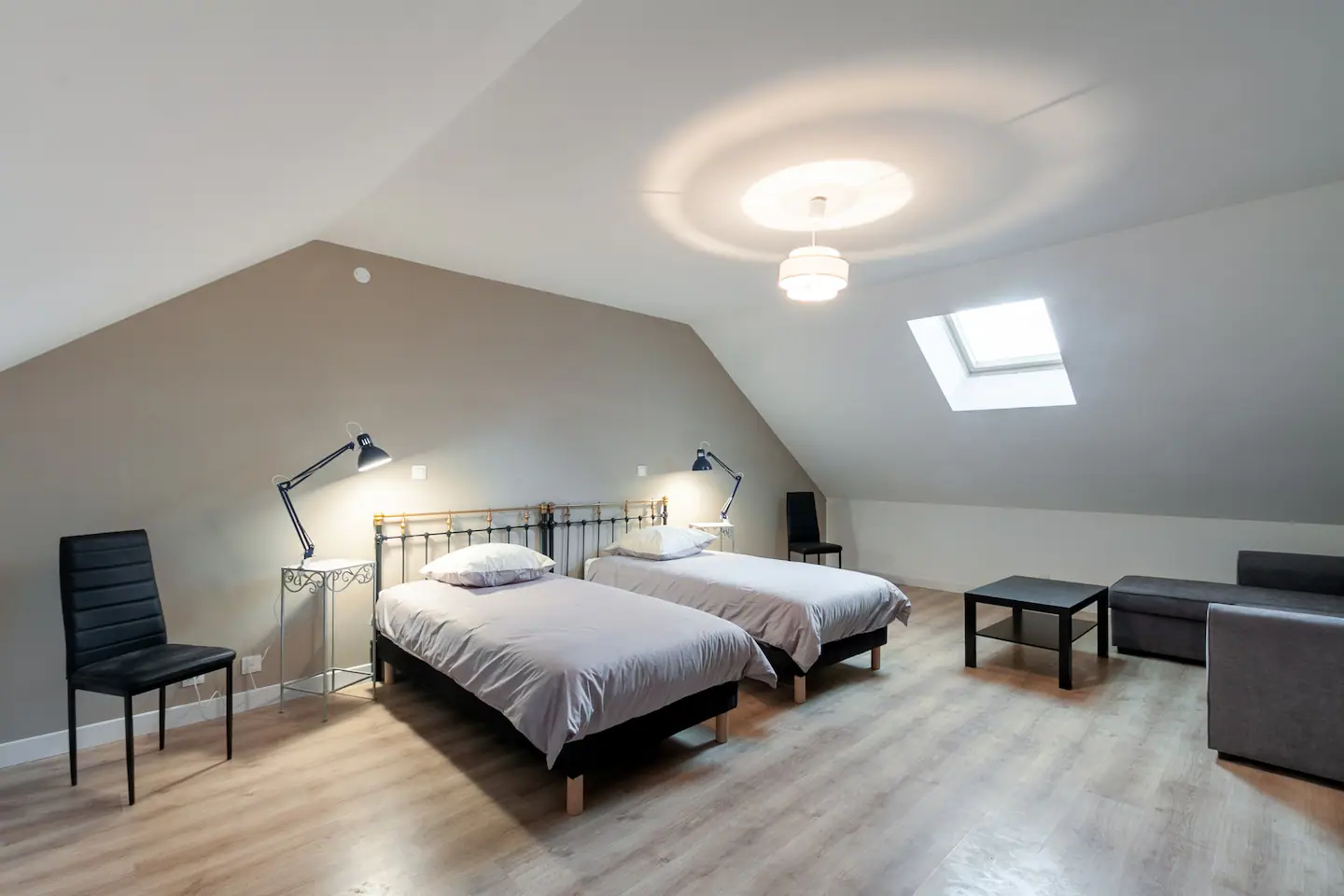 Spacious bedroom with a large double bed