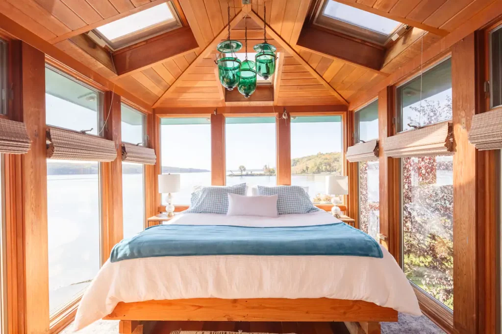 Watch as the sun rises and sets on this riverside retreat with panoramic views.