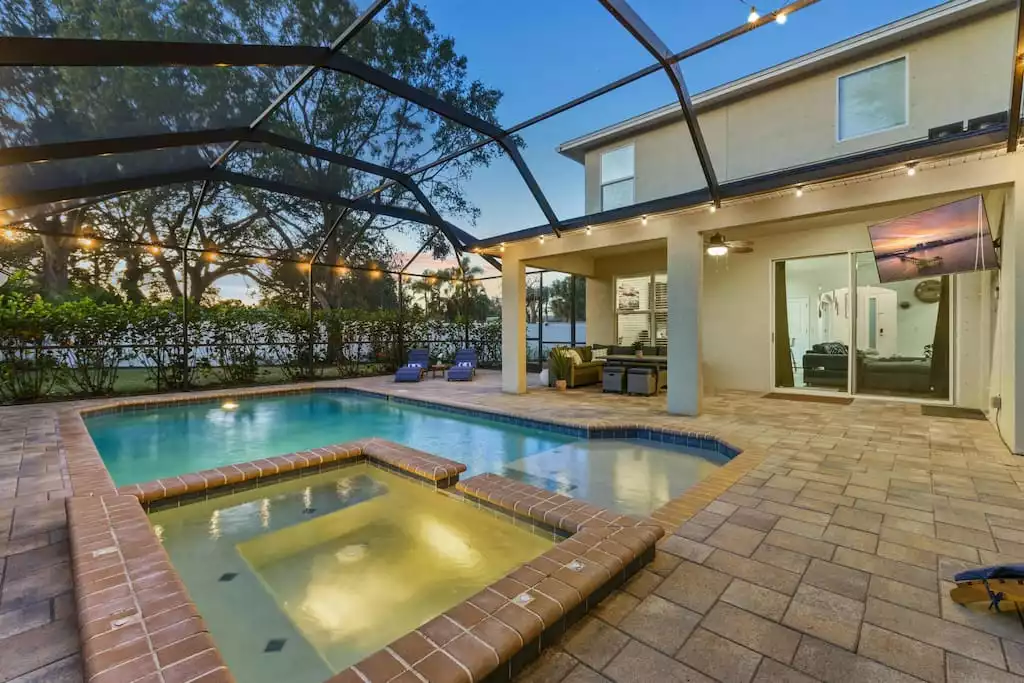 Tampa Airbnb With Private Pool - Enjoy our enclosed huge new heated pool and hot tub