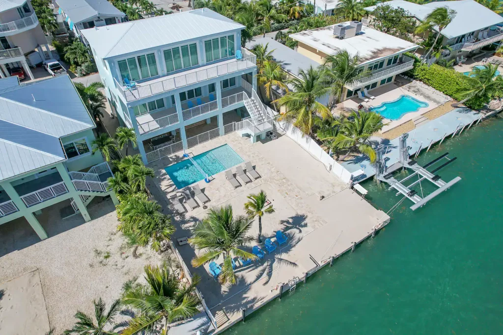 Private Pool, Private Sands, Private Dock - This home is just as incredible outside as it is inside.
